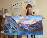 Sunrise on Lake Louise with artist